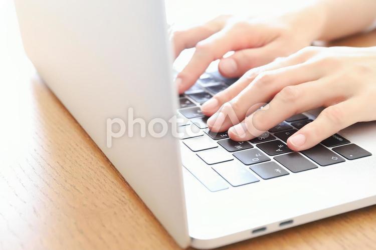 Business image at hand touching a computer, computer, laptop, notebook pc, JPG