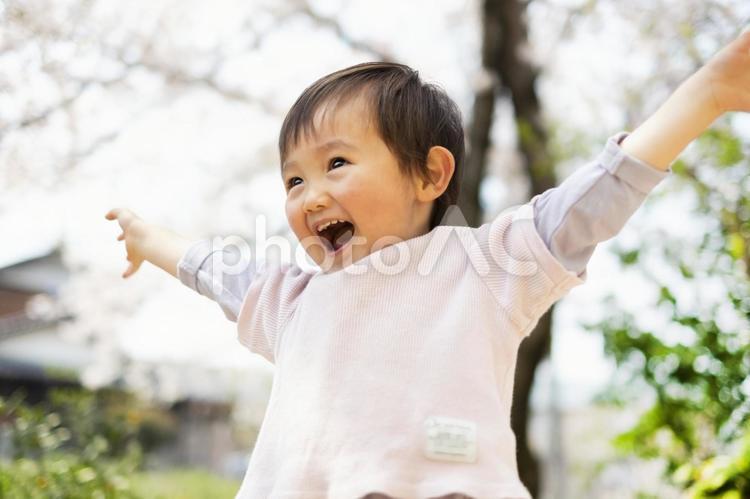 2-year-old child with both hands open, children, a smile, boy, JPG