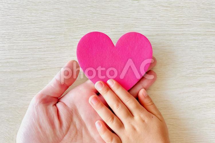 Parent-child hands and hearts Gentle image, parenting, love, trust, JPG