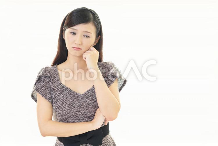 Woman thinking, female, to think about, to worry, JPG