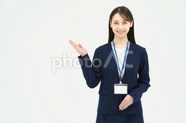 Woman in a suit, business, guide, receptionist, JPG