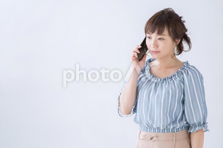Smartphone and woman (serious face), female, get angry, mobile phone, JPG